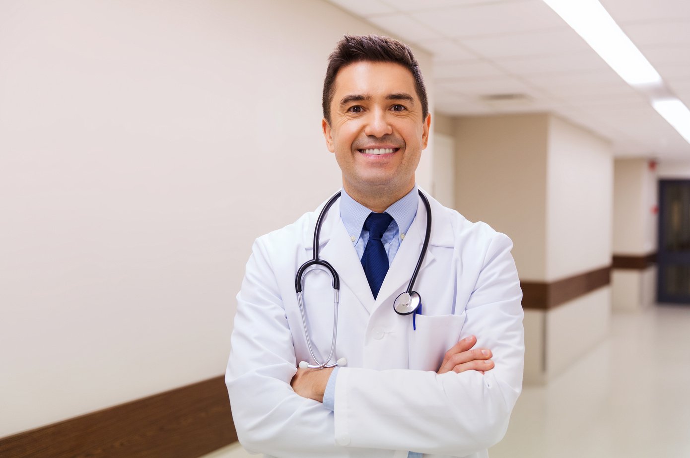 Smiling Doctor in White Coat  